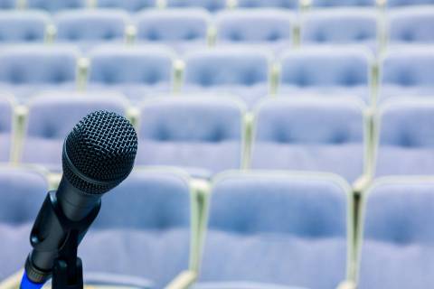 Microphone in front of seats in a conference room