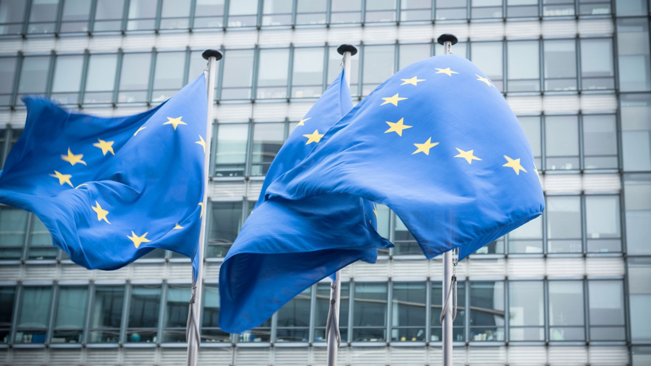 European flag in front of glass facade