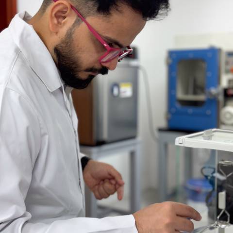 A laboratory employee carries out a test