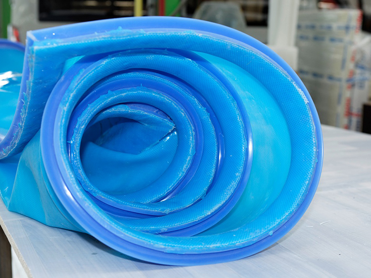 For the infusion and prepreg methods, alongside resin additives, WACKER also supplies silicone rubber grades and fabrics for the production of vacuum bags.These bags can be placed quickly and securely over the mold before each part is produced. Repeated, time-consuming sealing with conventional vacuum film is no longer necessary. Bags made with rapid-curing, two-part ELASTOSIL&reg; silicone rubber guarantee more processing runs, fewer vapors and more flexibility. 